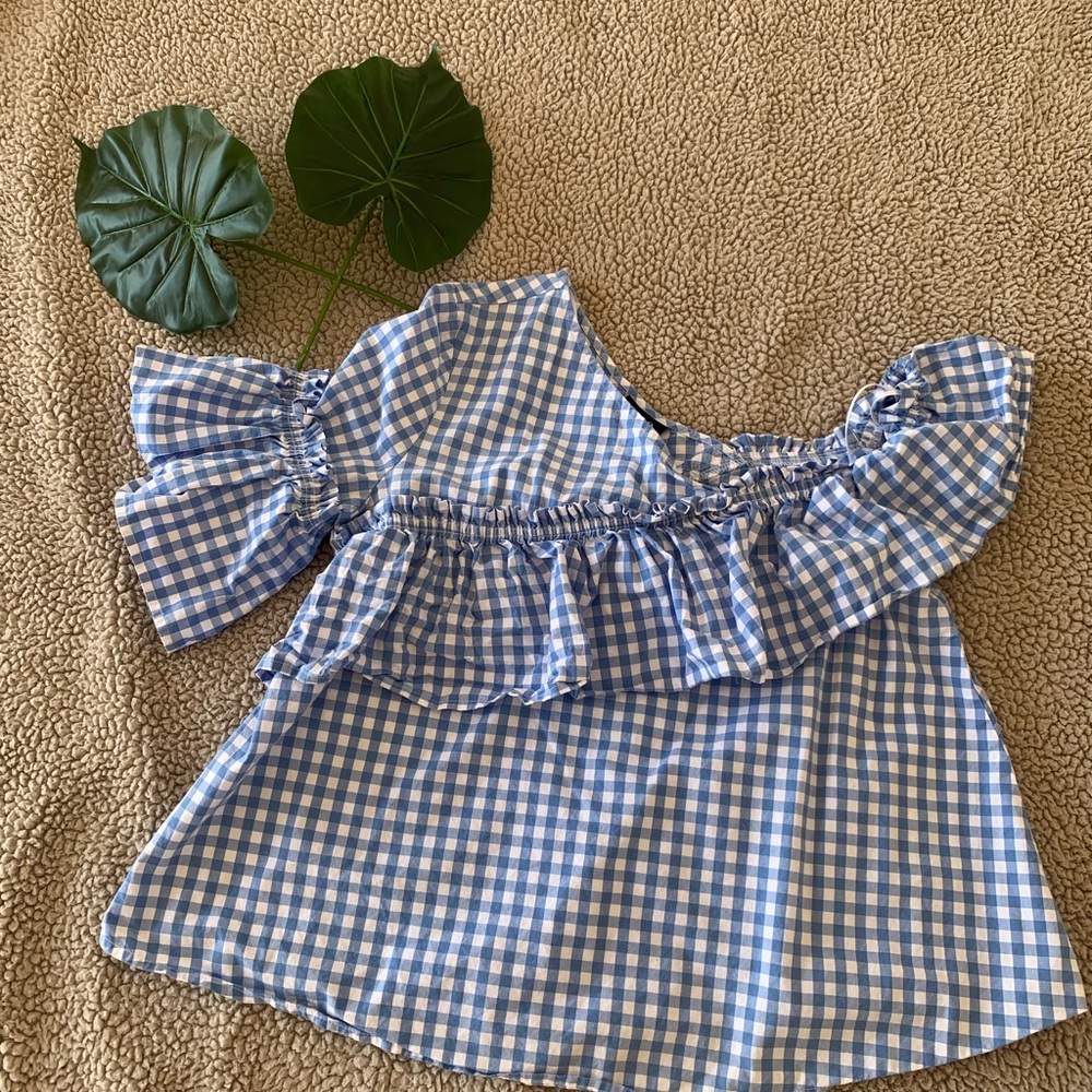 Blue and white plaid blouse